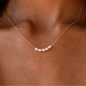 Elegant Gold Necklace with Pearl Accents